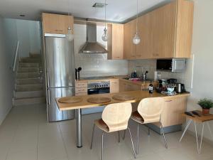 A kitchen or kitchenette at The New Suite Agaete & Parking