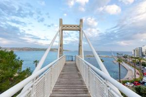 a bridge over a body of water at SPB26 - Seafront House in Bugibba in St Paul's Bay