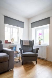 Posezení v ubytování Moderne 2-Zimmer Wohnung