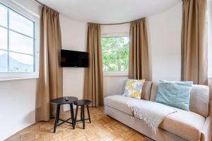 Televízia a/alebo spoločenská miestnosť v ubytovaní Apartment Sonnleitner + 37 fotografií