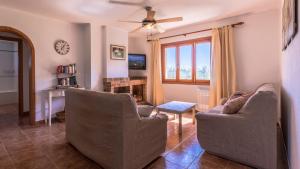 A television and/or entertainment centre at Villa Son Fanals
