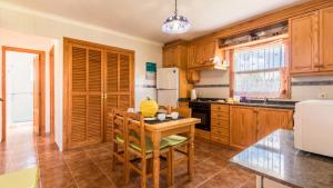 A kitchen or kitchenette at Villa Son Fanals