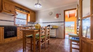 A kitchen or kitchenette at Villa Son Fanals