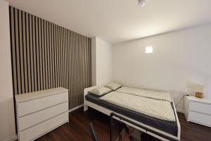 Postel nebo postele na pokoji v ubytování Block 96 Apartments
