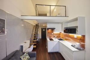 Kuchyň nebo kuchyňský kout v ubytování Block 96 Apartments