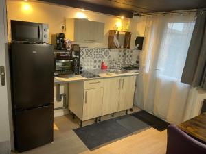 Dapur atau dapur kecil di Bel appartement cosy centre Veules-Les-Roses Parking privé WIFi +24 gambar