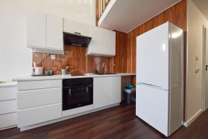 Kuchyň nebo kuchyňský kout v ubytování Block 96 Apartments