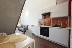 Kuchyň nebo kuchyňský kout v ubytování Block 96 Apartments