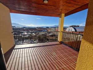 a balcony with a view of the mountains at Apartament Eva in Cristian