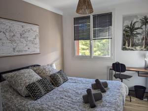 Ліжко або ліжка в номері T3 Calme Balcon Climatisation et Parking gratuit - Netflix - Stade Vélodrome
