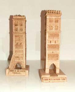 two toy buildings are sitting next to each other at Las Dos Torres in Teruel