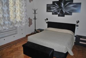 Postel nebo postele na pokoji v ubytování CASA RITA e CASA LUIGI