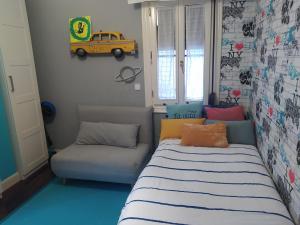 Posteľ alebo postele v izbe v ubytovaní Nuestro refugio - Casco Viejo con wifi y parking gratuito-