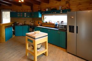Una cocina o zona de cocina en Chata Exit