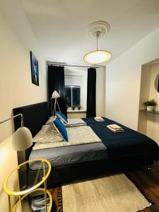 Posteľ alebo postele v izbe v ubytovaní Apartament Zdrój Lądek