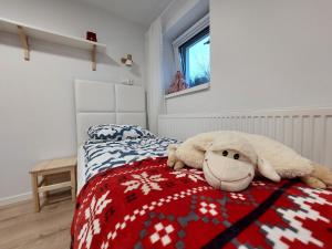 Sielankowo tesisinde bir odada yatak veya yataklar
