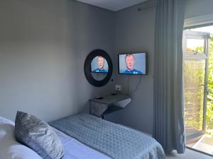 Ένα ή περισσότερα κρεβάτια σε δωμάτιο στο Blou-Beauty