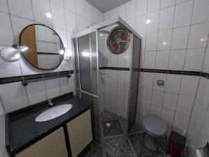 Koupelna v ubytování Casa espaçosa em Matinhos