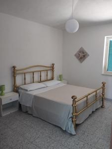 Postel nebo postele na pokoji v ubytování Villa Bianca