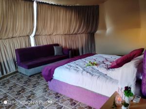 Łóżko lub łóżka w pokoju w obiekcie wadi rum caeser camp