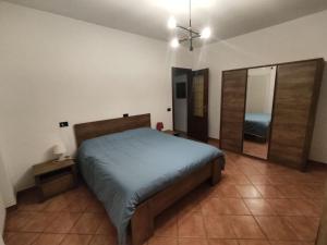 a bedroom with a bed in a room at Sonia sweet home in Candelo