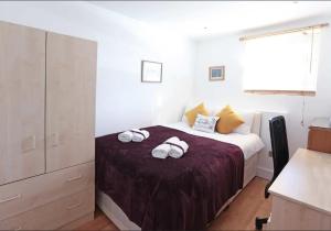Postel nebo postele na pokoji v ubytování Lovely Private Bedrooms in Euston, Central London + 13 fotografií