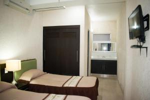 Foto de la galería de Suites del Sol Hotel & Apartments en Mérida