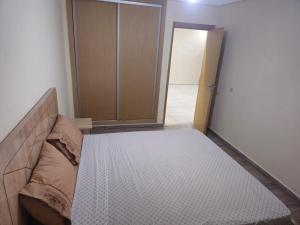 Ένα ή περισσότερα κρεβάτια σε δωμάτιο στο Apparemment Tout Confort Wifi +18 φωτογραφίες