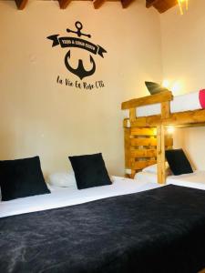 Postel nebo postele na pokoji v ubytování Casa Hostal La Vie en Rose
