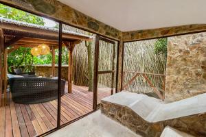 Ένα ή περισσότερα κρεβάτια σε δωμάτιο στο Hotel Spa La Colina