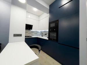 Kuchyň nebo kuchyňský kout v ubytování Appart Jiqia Residence