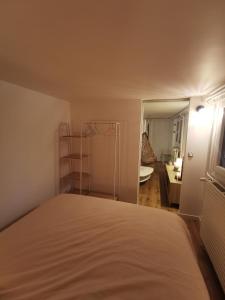 Postel nebo postele na pokoji v ubytování L'Orée, appartement cosy, 4 à 6 pers