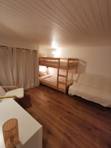 Postel nebo postele na pokoji v ubytování L'Orée, appartement cosy, 4 à 6 pers + 22 fotografií