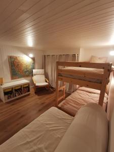 Postel nebo postele na pokoji v ubytování L'Orée, appartement cosy, 4 à 6 pers