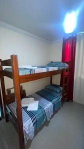 Postel nebo postele na pokoji v ubytování Flat Residence Maragogi