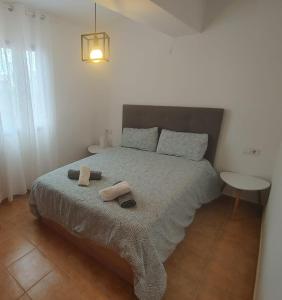 Postel nebo postele na pokoji v ubytování Formentera Suite 5