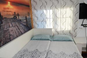 Un pat sau paturi într-o cameră la LOS TOCHOS