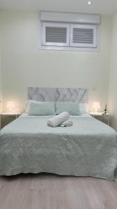Posteľ alebo postele v izbe v ubytovaní HABITACION CENTRAL CON WIFI