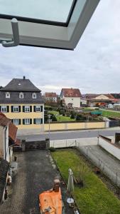 a view from a window of a building at AS5 Two Hallstadt - Gäste-Favorit - Modern, Ruhig & 5 Min zum Zug nach Bamberg - BeMa Apartments in Hallstadt