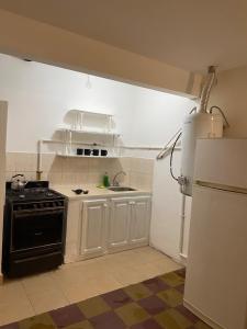 Η κουζίνα ή μικρή κουζίνα στο Buen pasar