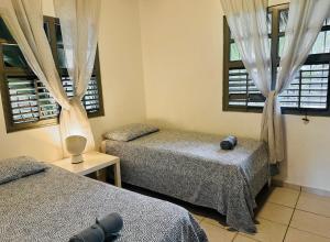 Postel nebo postele na pokoji v ubytování EverGreen Cabarete + 11 fotografií