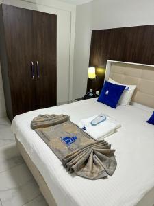 Hôtel Esma Nouadhibou客房内的一张或多张床位