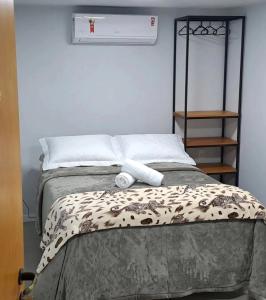 Un pat sau paturi într-o cameră la Casa Missões Dill Haus 1