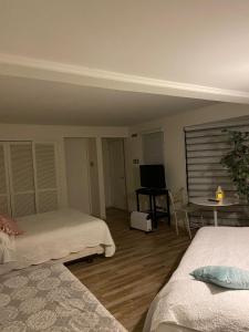 Cama o camas de una habitación en BERMUDAS INN CHILLAN PANAMERICANA NORTE 3645