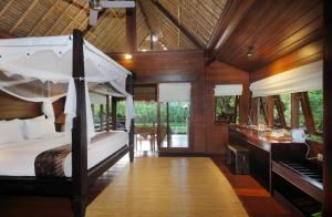 Tegal Sari Accommodation Ubud客房内的一张或多张床位