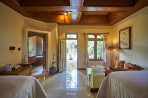 Tegal Sari Accommodation Ubud客房内的一张或多张床位