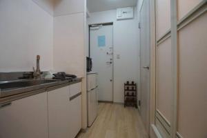 Kuchyň nebo kuchyňský kout v ubytování TokyoGuest 浜町