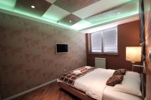 Postel nebo postele na pokoji v ubytování Apartments Belgrade