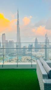 a view of a city skyline from a building at Walking distance to dubai mall Full burj Khalifa view and fountain view new year full fireworks view 2BR in Dubai