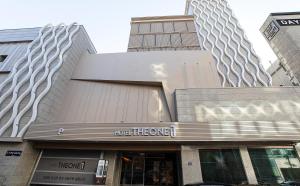 a store front of a building with two tall buildings at INCHEON AIRPORT HOTEL THE ONe in Incheon +35 photos